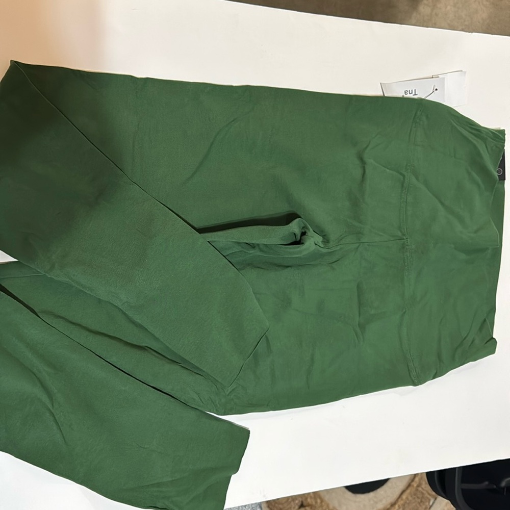 TNA new with tags. Ankle high rise dark green emerald leggings.